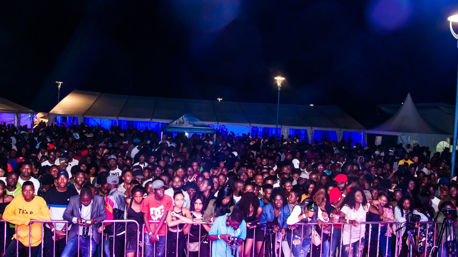 Crowd barriers in place at a night event