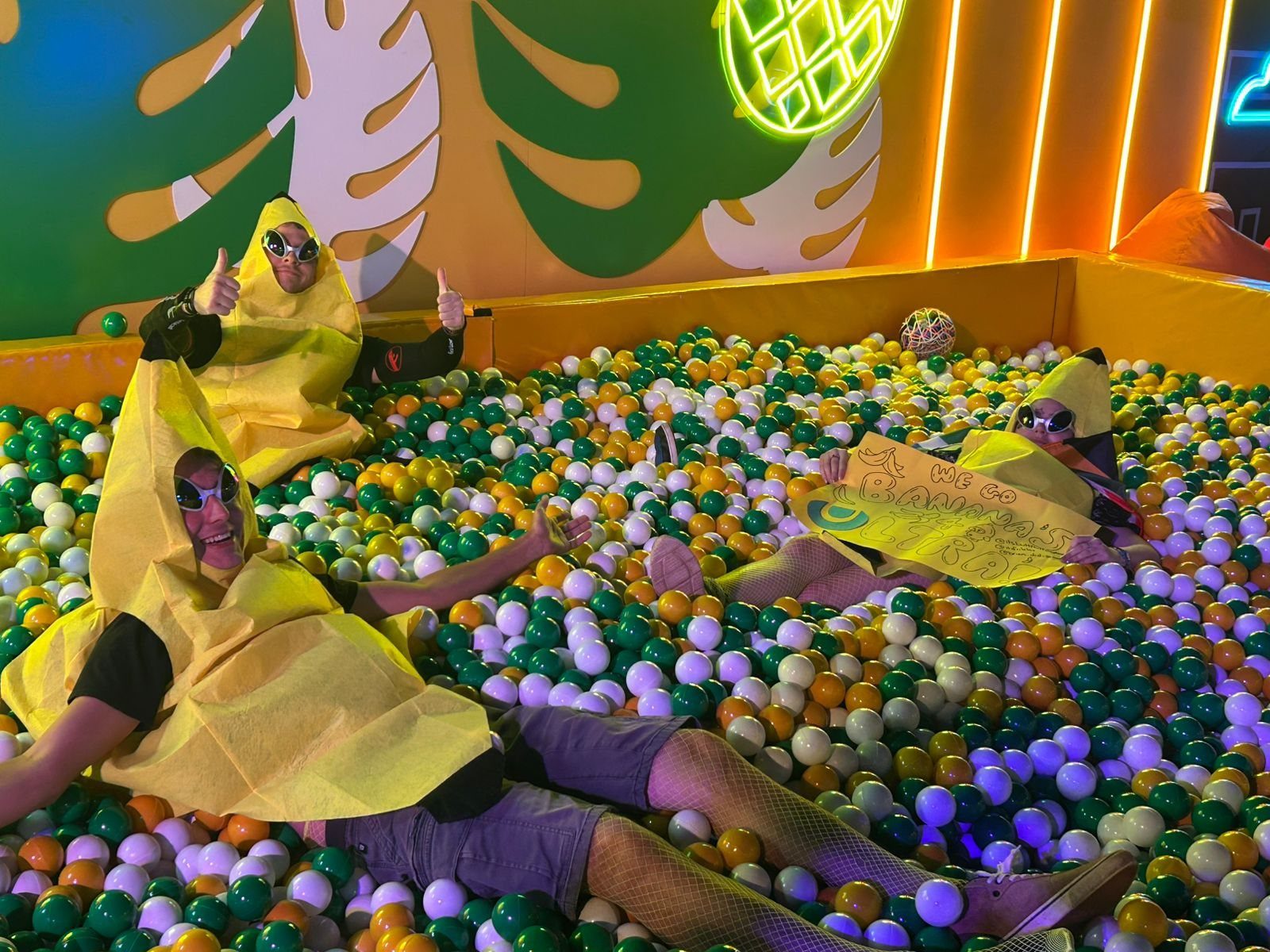Guests in a ball pit at a team-build activation